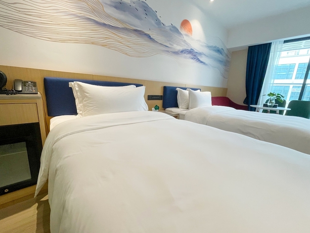 Imagen de la habitación del Hotel Baiyun Airport Cocoa. Foto 12