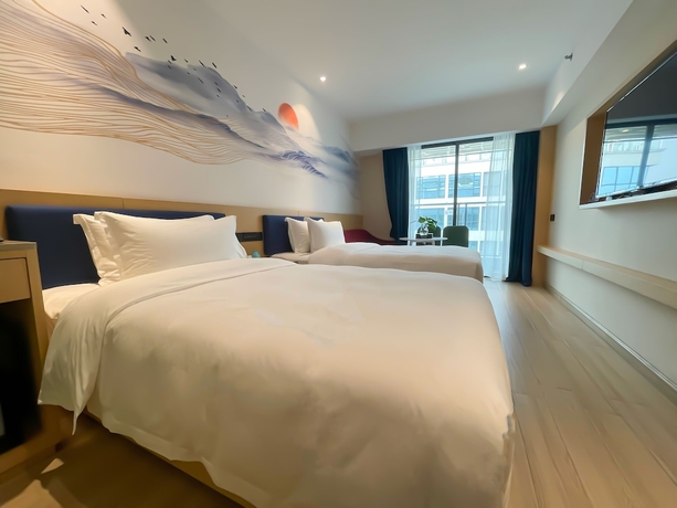Imagen de la habitación del Hotel Baiyun Airport Cocoa. Foto 15