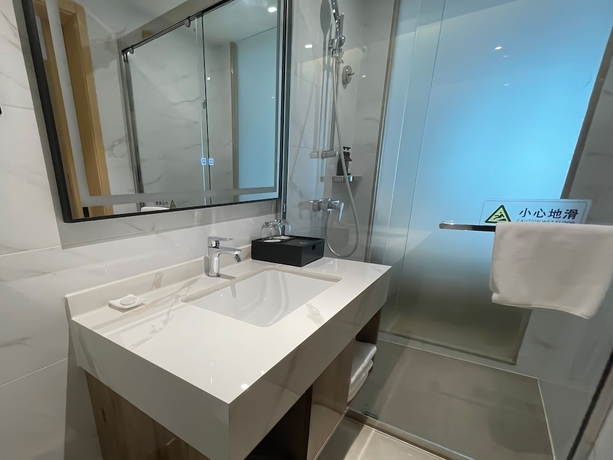 Imagen de la habitación del Hotel Baiyun Airport Cocoa. Foto 17