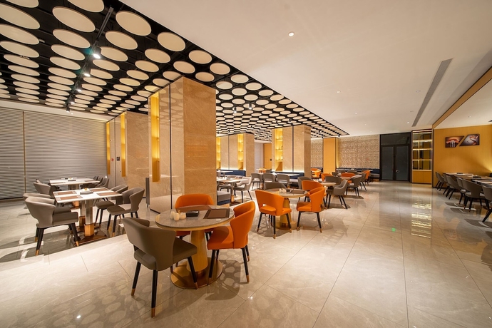 Imagen del bar/restaurante del Hotel Baiyun Airport Cocoa. Foto 6