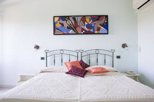 Imagen de la habitación del Hotel Baja Azzurra, Torre di Bari. Foto 5