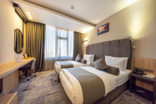 Imagen de la habitación del Hotel Başkent Center. Foto 20