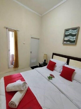 Imagen de la habitación del Hotel Bakom Inn Syariah. Foto 8