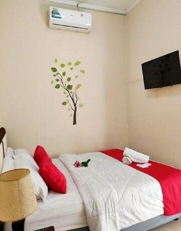 Imagen de la habitación del Hotel Bakom Inn Syariah. Foto 9