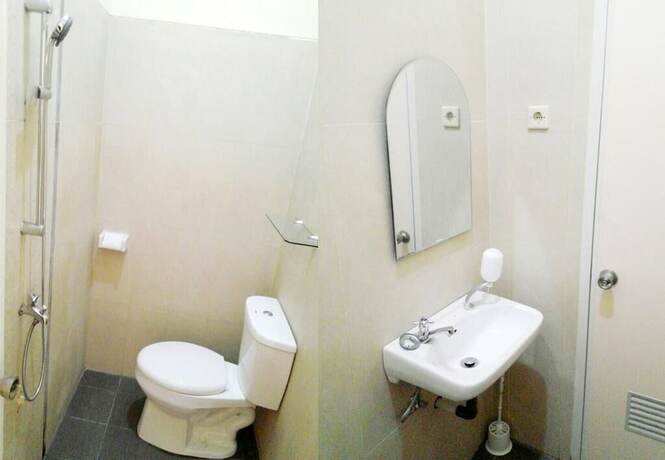 Imagen de la habitación del Hotel Bakom Inn Syariah. Foto 10