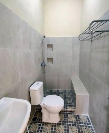 Imagen de la habitación del Hotel Bakom Inn Syariah. Foto 11