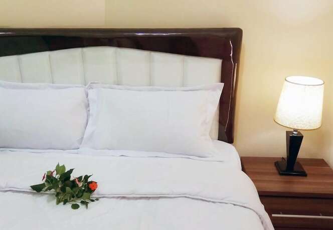 Imagen de la habitación del Hotel Bakom Inn Syariah. Foto 12