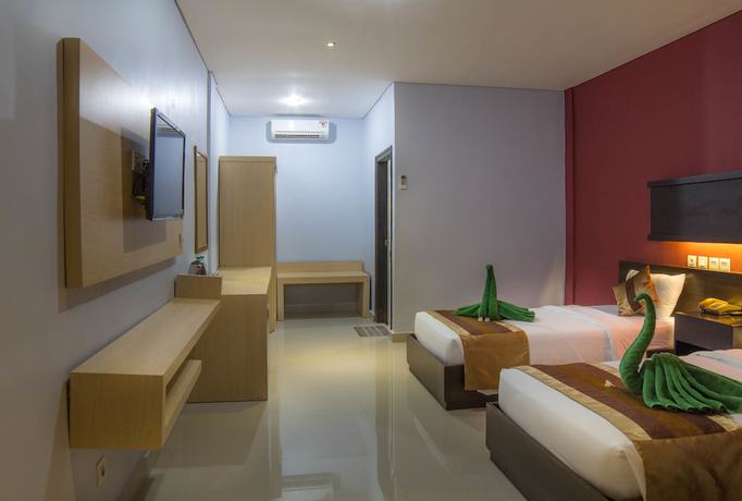 Imagen de la habitación del Hotel Bakung Beach Resort. Foto 6