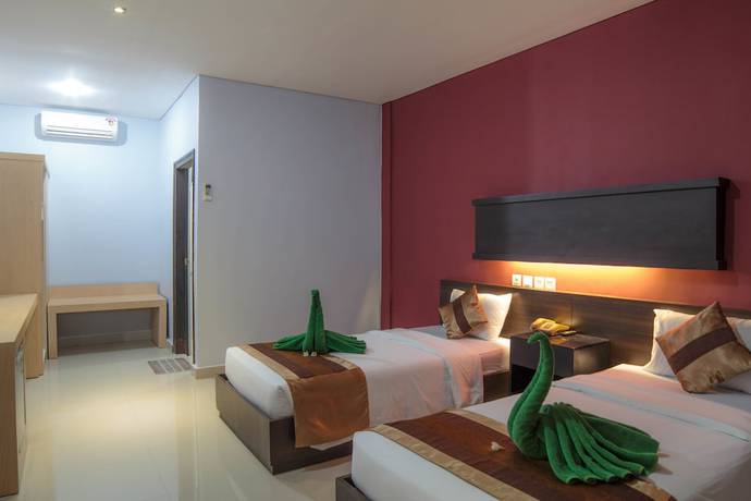 Imagen de la habitación del Hotel Bakung Beach Resort. Foto 9