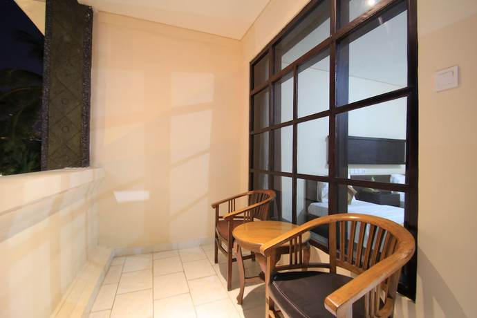 Imagen de la habitación del Hotel Bakung Beach Resort. Foto 12