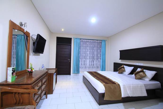 Imagen de la habitación del Hotel Bakung Beach Resort. Foto 13