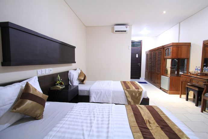 Imagen de la habitación del Hotel Bakung Beach Resort. Foto 14