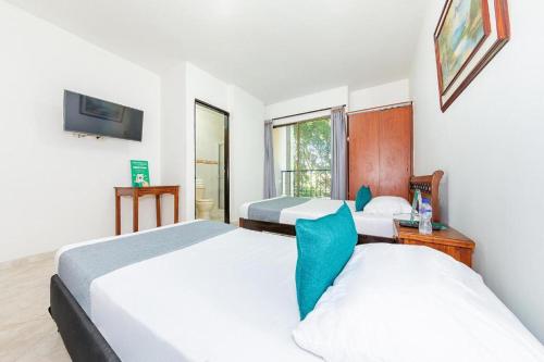 Imagen de la habitación del Hotel Balcones 70 Laureles. Foto 16