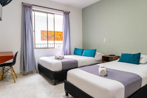 Imagen de la habitación del Hotel Balcones 70 Laureles. Foto 20