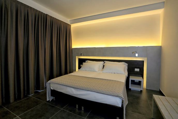 Imagen de la habitación del Hotel Baldinini. Foto 13