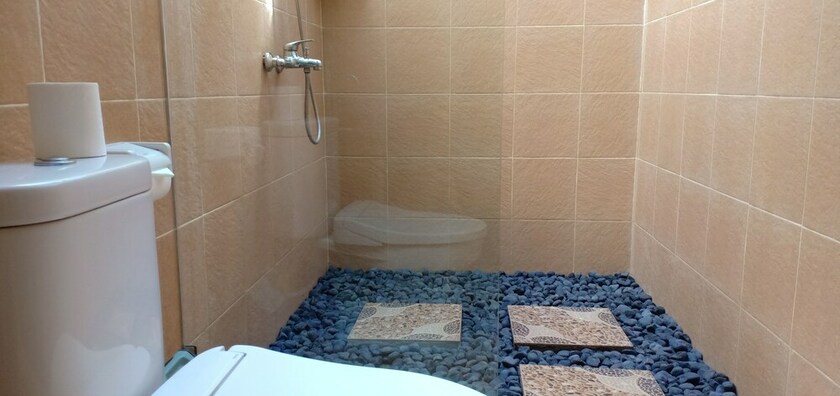 Imagen de la habitación del Hotel Bale Lumbung Bungalows. Foto 32