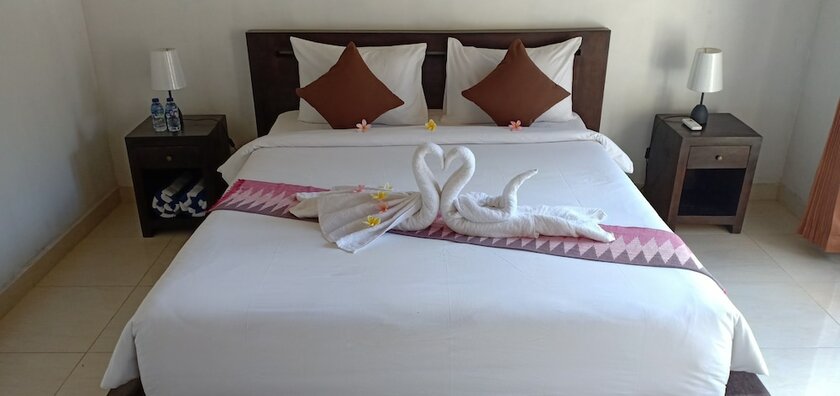 Imagen de la habitación del Hotel Bale Lumbung Bungalows. Foto 33