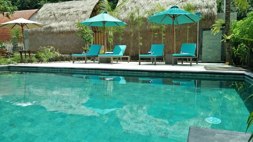 Imagen de la piscina del Hotel Bale Lumbung Bungalows. Foto 35