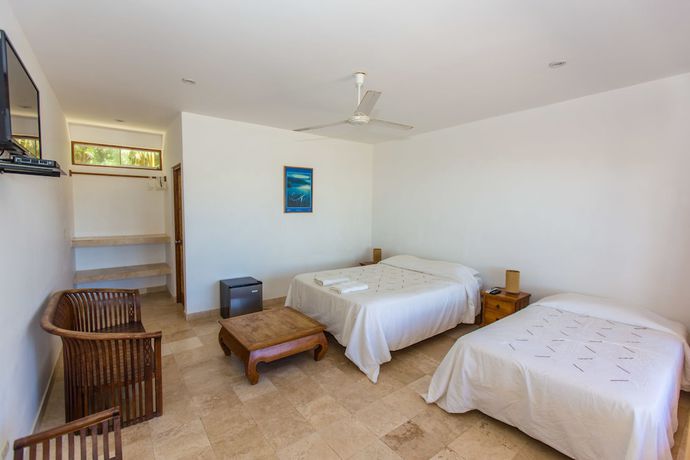 Imagen de la habitación del Hotel Bali Hai Bungalows. Foto 7
