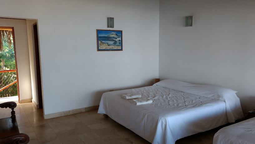 Imagen de la habitación del Hotel Bali Hai Bungalows. Foto 11
