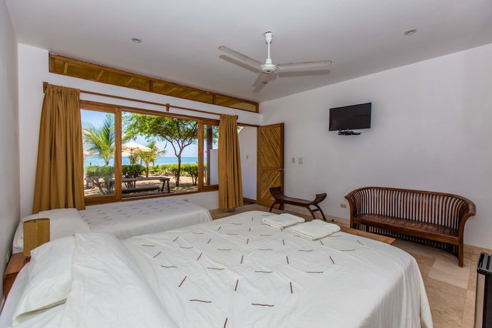 Imagen de la habitación del Hotel Bali Hai Bungalows. Foto 12