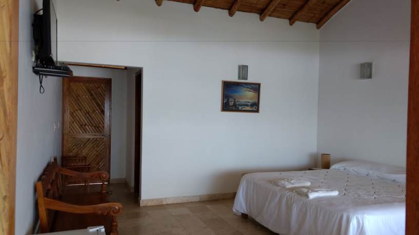 Imagen de la habitación del Hotel Bali Hai Bungalows. Foto 13