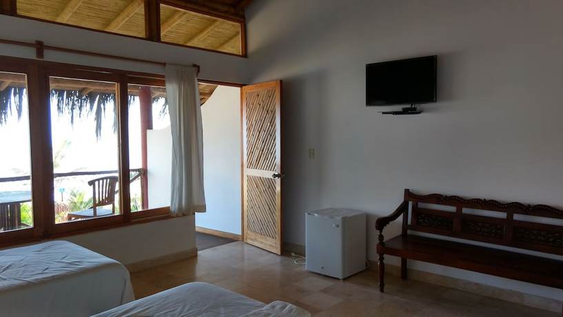 Imagen de la habitación del Hotel Bali Hai Bungalows. Foto 18
