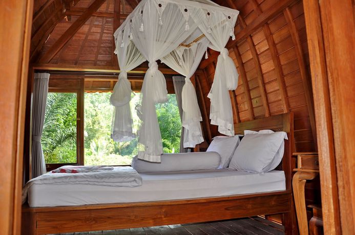 Imagen de la habitación del Hotel Bali Jungle Huts. Foto 3