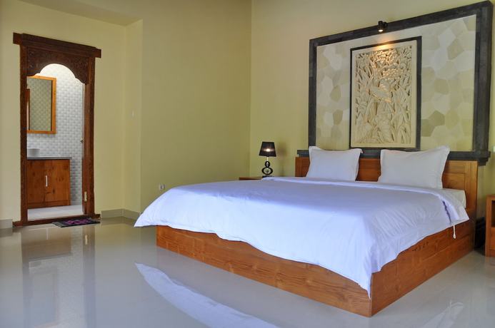 Imagen de la habitación del Hotel Bali Jungle Huts. Foto 4