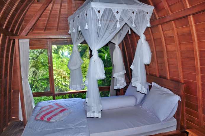 Imagen de la habitación del Hotel Bali Jungle Huts. Foto 6