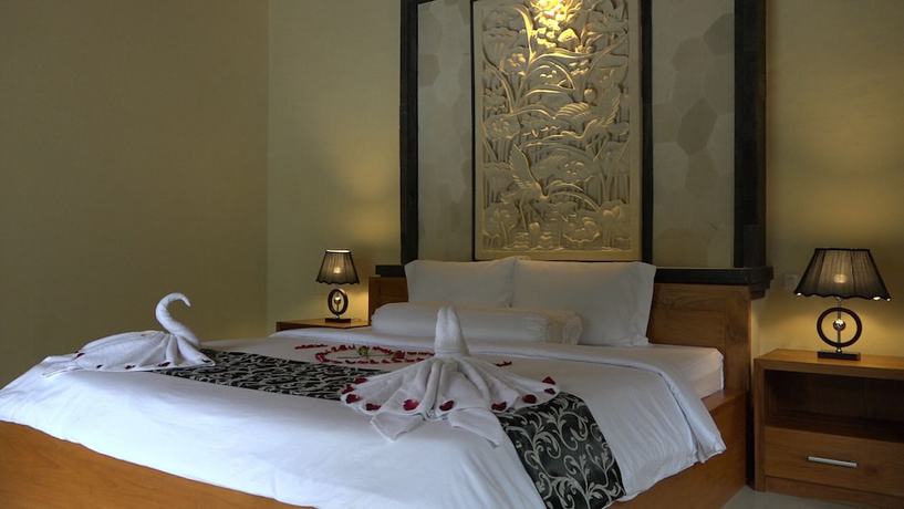 Imagen de la habitación del Hotel Bali Jungle Huts. Foto 11