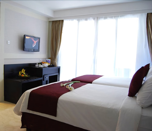 Imagen de la habitación del Hotel Bali Kuta Resort. Foto 4