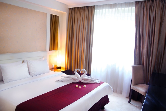 Imagen de la habitación del Hotel Bali Kuta Resort. Foto 8