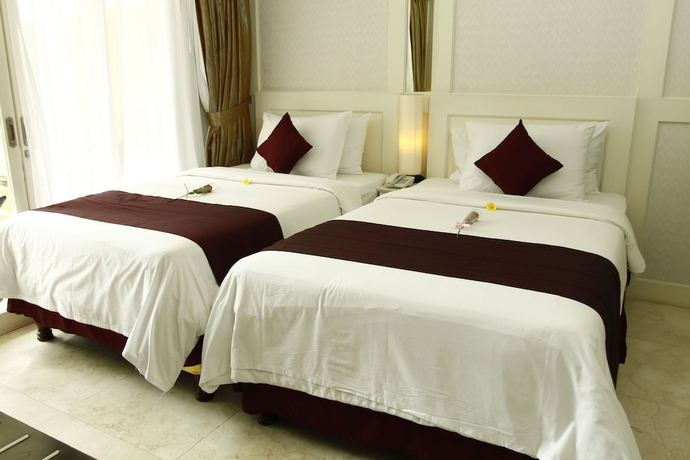 Imagen de la habitación del Hotel Bali Kuta Resort. Foto 10