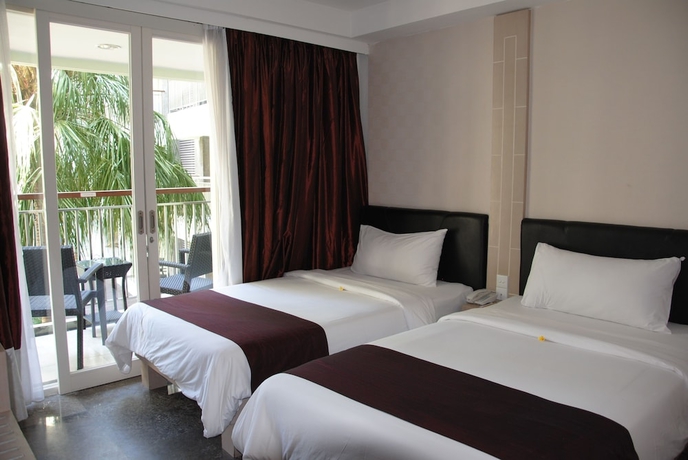 Imagen de la habitación del Hotel Bali Kuta Resort. Foto 11