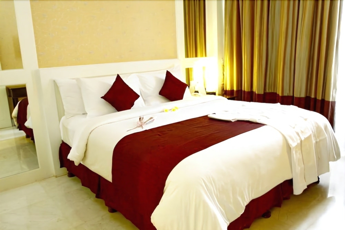 Imagen de la habitación del Hotel Bali Kuta Resort. Foto 12