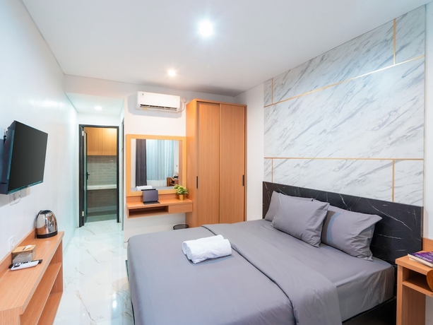 Imagen de la habitación del Hotel Bali Loop Coliving and Coworking. Foto 13