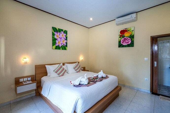 Imagen de la habitación del Hotel Bali Nusa Cottage. Foto 17