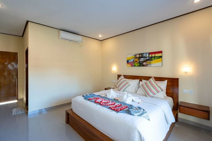 Imagen de la habitación del Hotel Bali Nusa Cottage. Foto 20