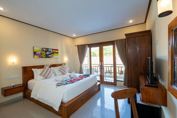 Imagen de la habitación del Hotel Bali Nusa Cottage. Foto 21