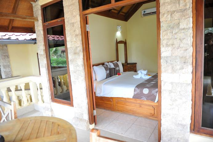 Imagen de la habitación del Hotel Bali Palms Resort. Foto 9