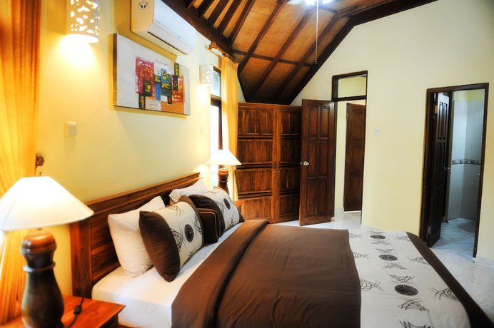 Imagen de la habitación del Hotel Bali Palms Resort. Foto 14