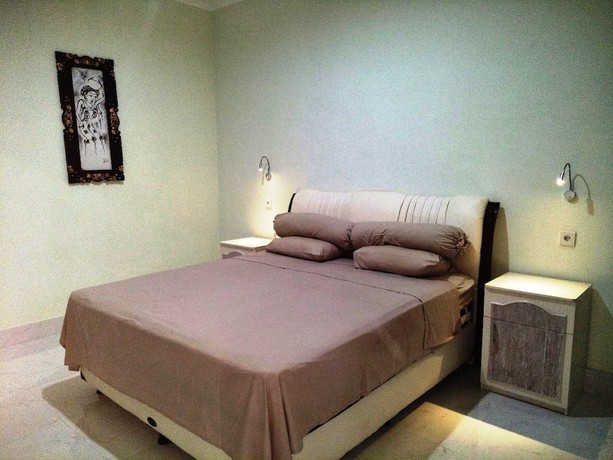 Imagen de la habitación del Hotel Bali Paradise Suites Seminyak. Foto 4