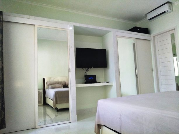 Imagen de la habitación del Hotel Bali Paradise Suites Seminyak. Foto 6