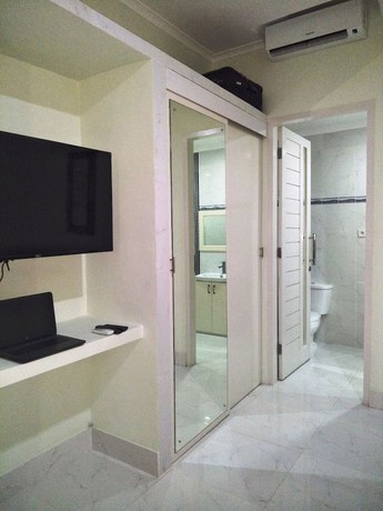 Imagen de la habitación del Hotel Bali Paradise Suites Seminyak. Foto 8