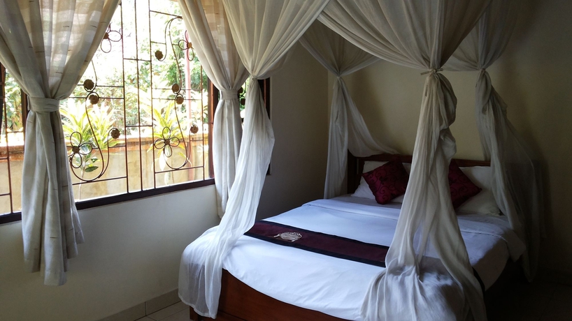 Imagen de la habitación del Hotel Bali Putra Villa. Foto 5