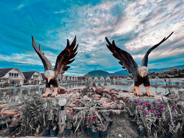 Imagen de los exteriores del Hotel Bali Villa Kampot. Foto 18