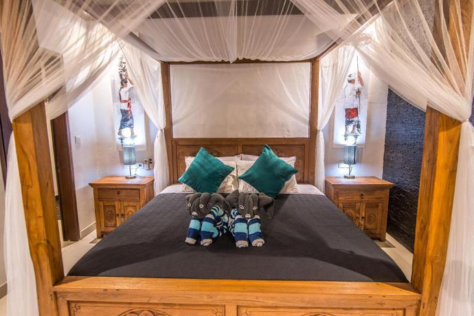 Imagen de la habitación del Hotel Balisanti Bungalows. Foto 6