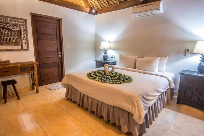 Imagen de la habitación del Hotel Balisanti Bungalows. Foto 7