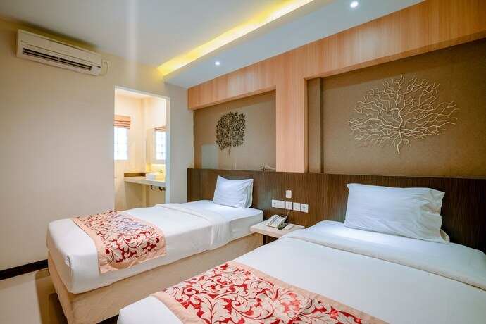 Imagen de la habitación del Hotel Balitone Guest House. Foto 16